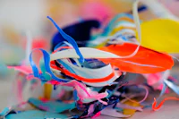 a pile of colorful paper
